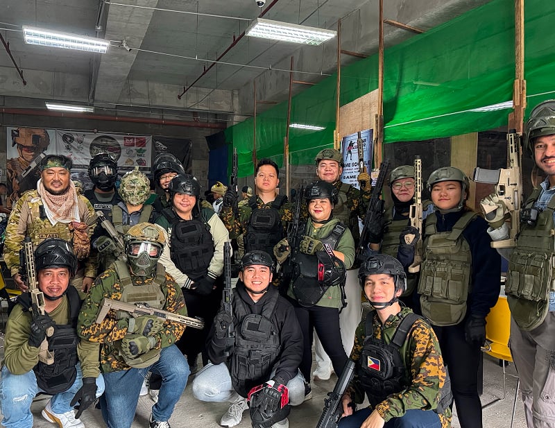 airsoft 1 Twoconnect team members enjoying an airsoft team-building activity in the Philippines