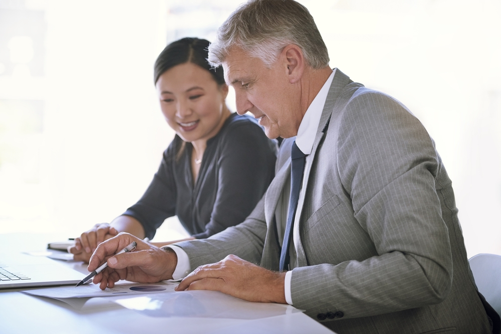 Business,People,,Planning,And,Paperwork,In,Meeting,For,Financial,Review shutterstock 2472674155