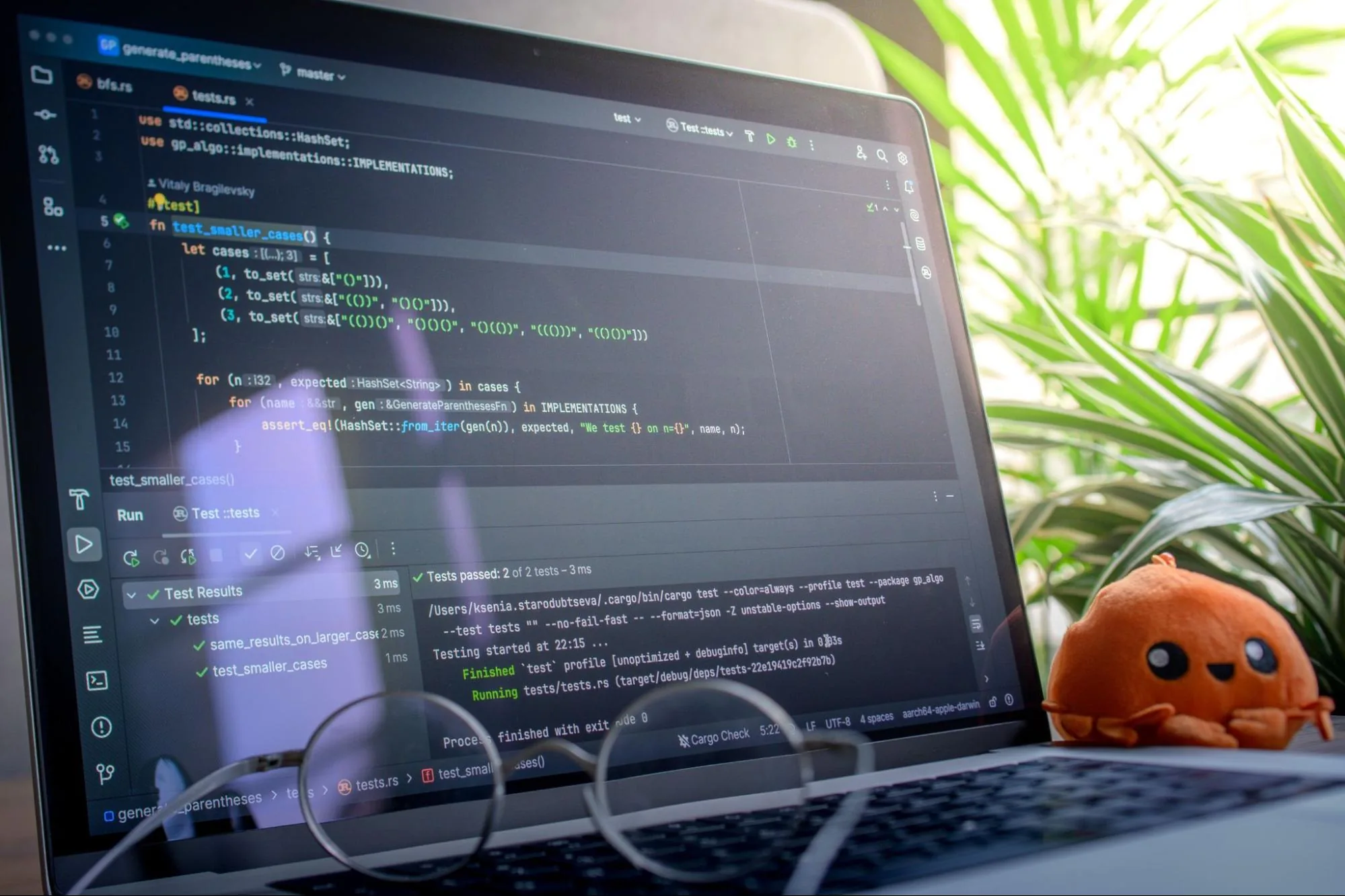 Laptop showing an IDE with Rust unit tests passing in the test runner panel